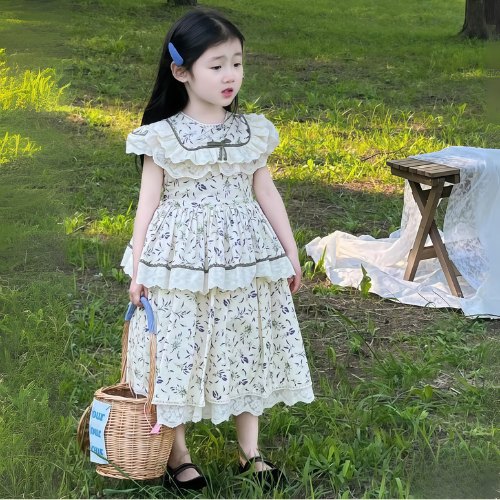 váy xòe tầng dễ thương cho bé nơ cài tóc